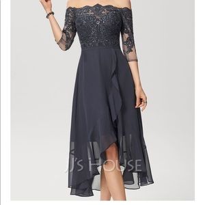 JJs house brand new dress with tag attached